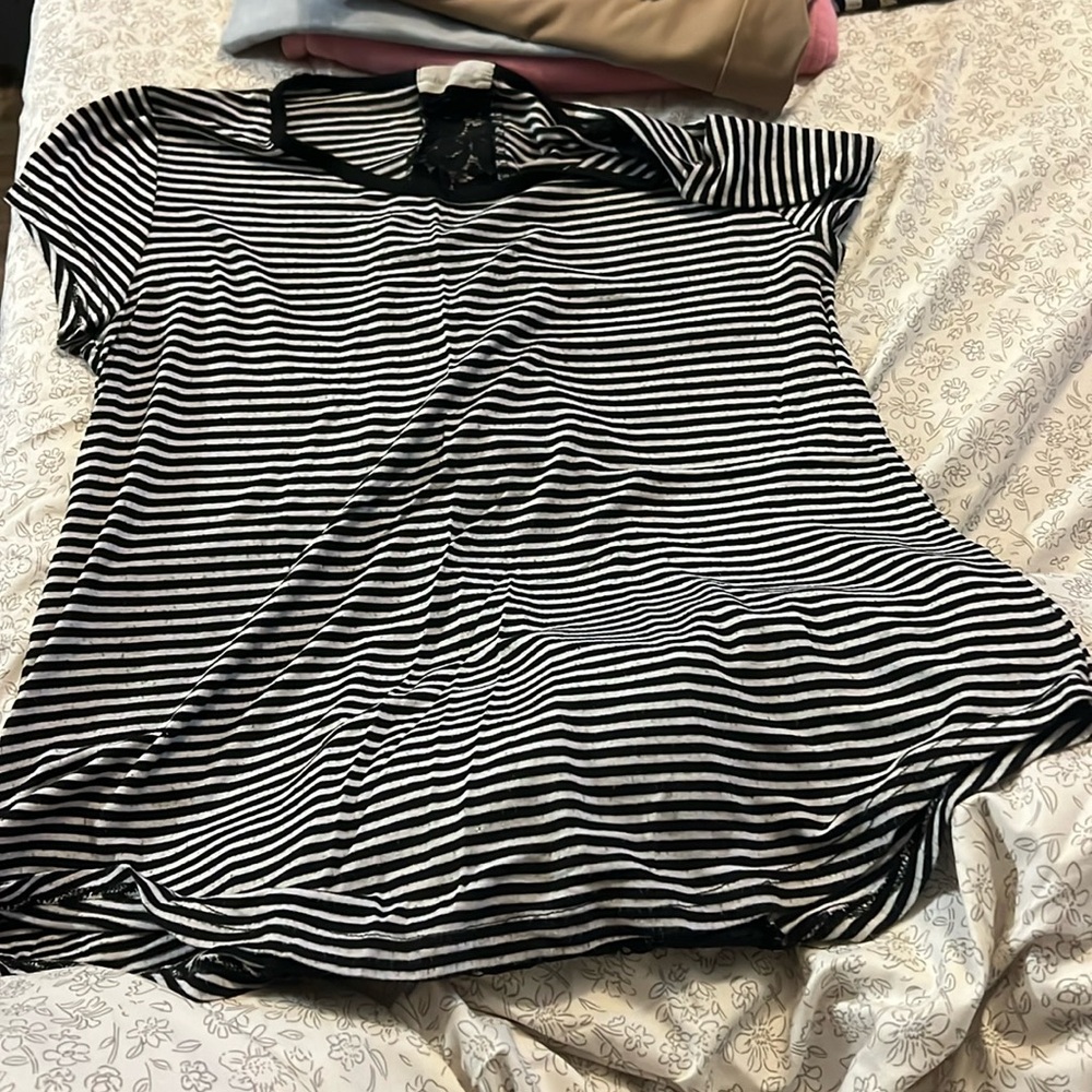 Black and white striped shirt.
